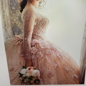 Quinceañera Dress size L.  Brand Calla Collection color rose gold.